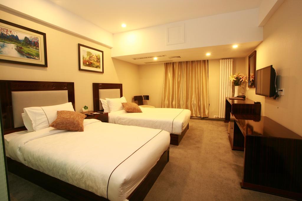 Harbin Yakelai Holiday Hotel Quarto foto