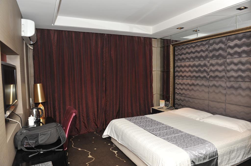 Harbin Yakelai Holiday Hotel Quarto foto