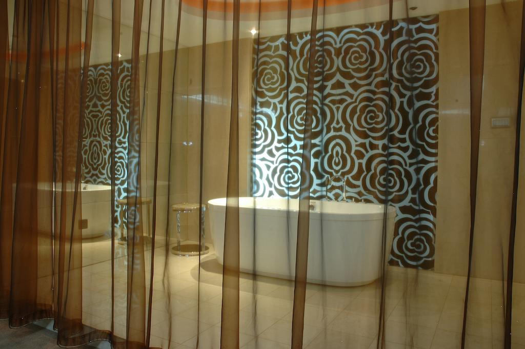 Harbin Yakelai Holiday Hotel Quarto foto