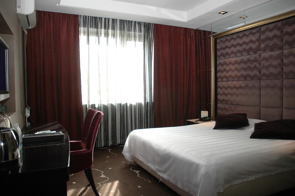 Harbin Yakelai Holiday Hotel Quarto foto