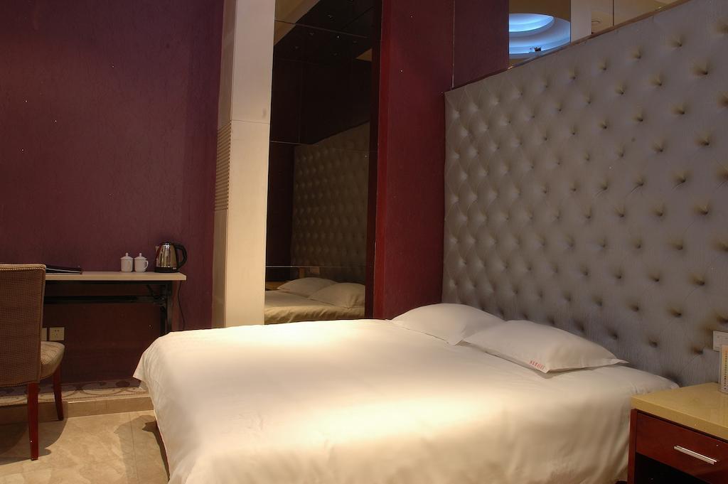 Harbin Yakelai Holiday Hotel Quarto foto