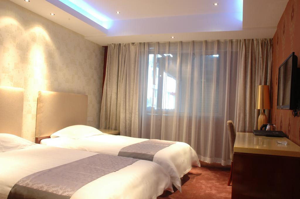 Harbin Yakelai Holiday Hotel Quarto foto