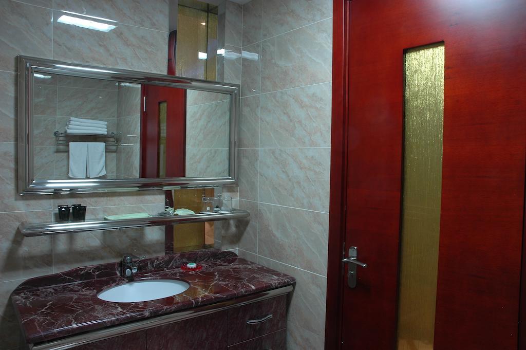 Harbin Yakelai Holiday Hotel Quarto foto