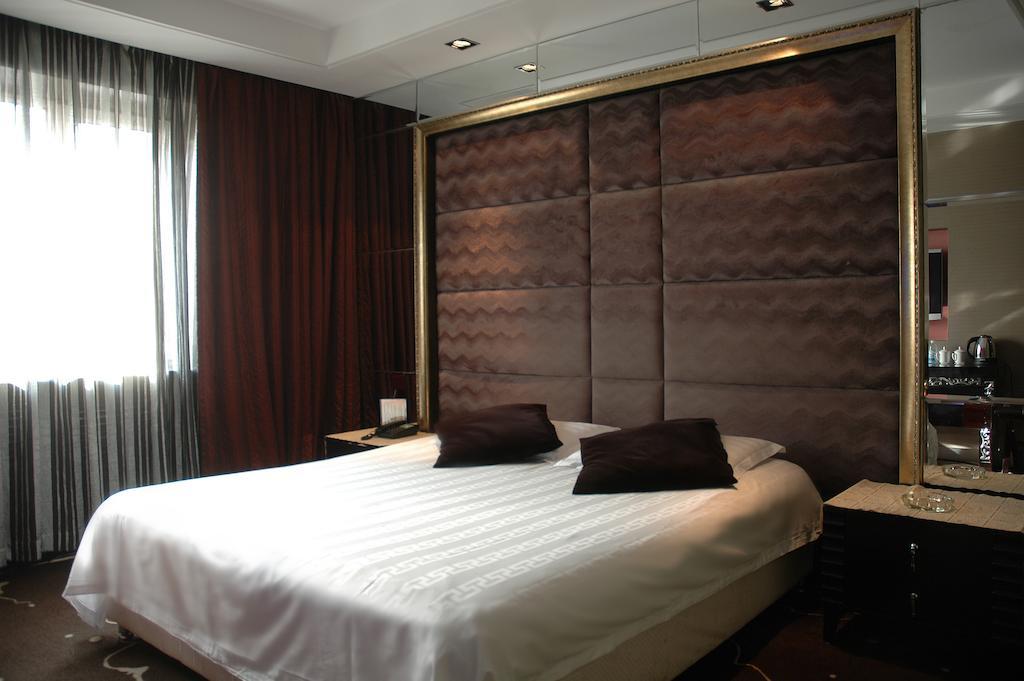 Harbin Yakelai Holiday Hotel Quarto foto