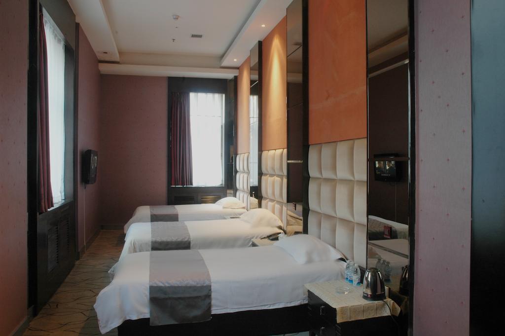Harbin Yakelai Holiday Hotel Quarto foto