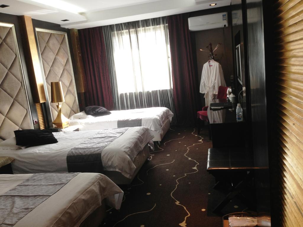 Harbin Yakelai Holiday Hotel Quarto foto