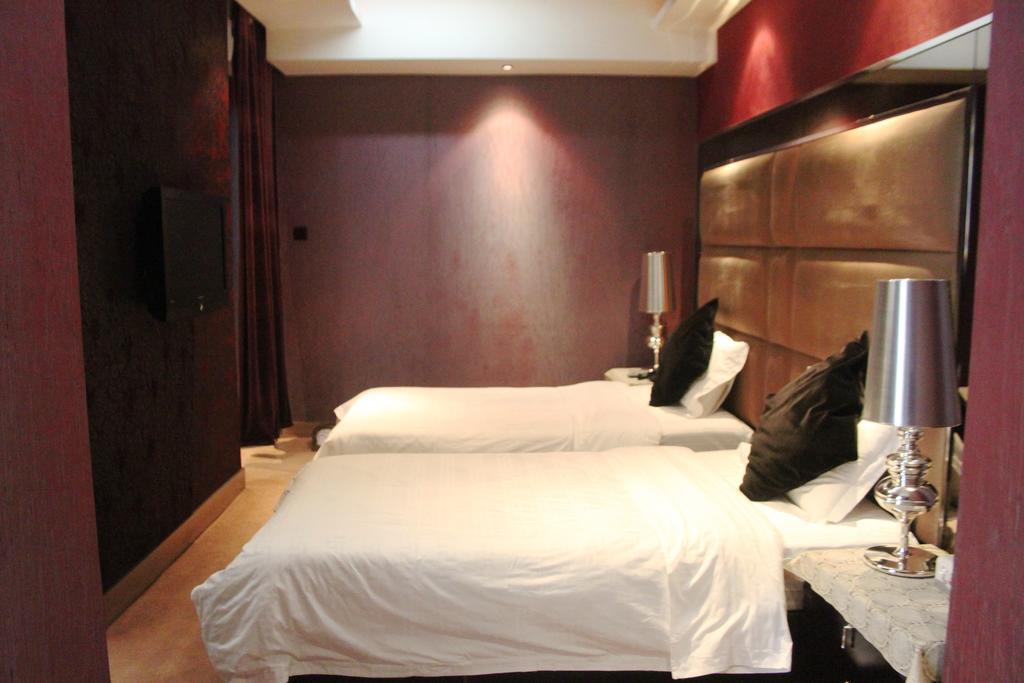 Harbin Yakelai Holiday Hotel Quarto foto