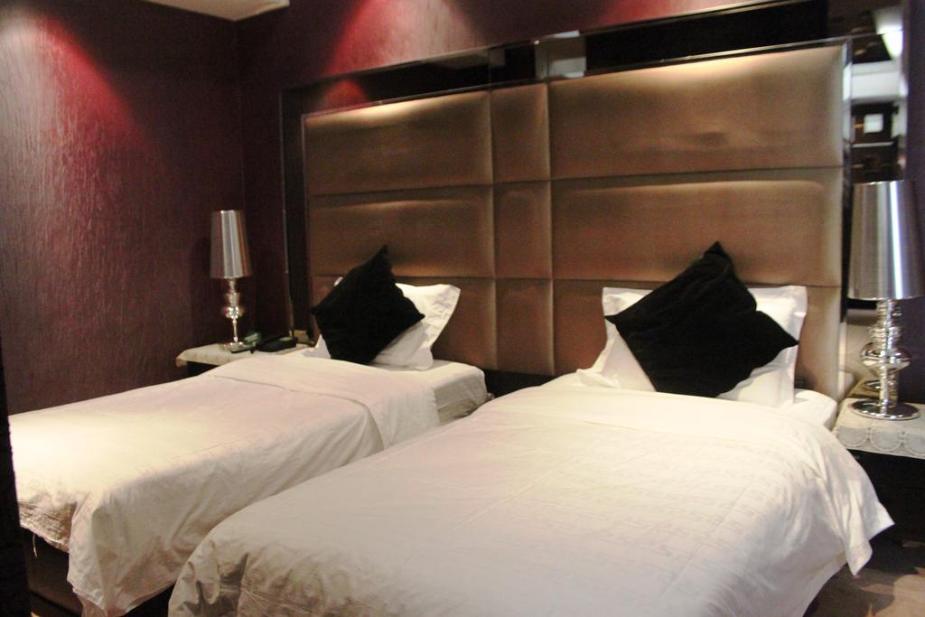 Harbin Yakelai Holiday Hotel Quarto foto