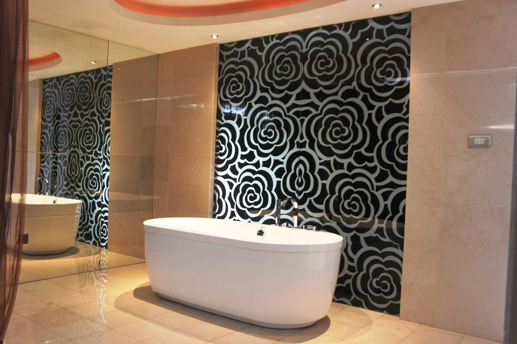 Harbin Yakelai Holiday Hotel Quarto foto